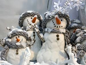 Fotos Feiertage Neujahr Schneemänner