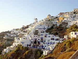 Bureaubladachtergronden Griekenland Santorini een stad