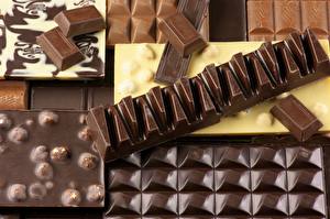Картинки Сладкая еда Шоколад Шоколадная плитка Еда