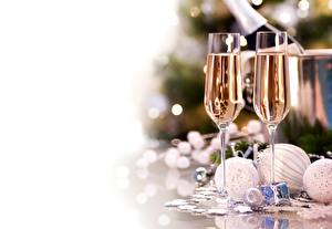 Bilder Feiertage Neujahr Champagner Weinglas Kugeln