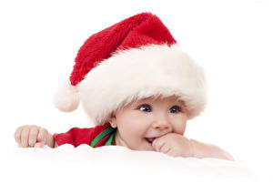 Фотографии Праздники Новый год Младенец В шапке Взгляд Дети