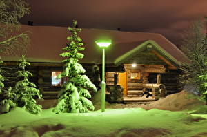 Картинки Времена года Зима Финляндия Снег Уличные фонари Деревьев Ночь Лапландия Природа