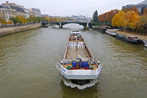 Tapety na pulpit Francja Rzeka Statek Mosty Tankowiec Kanał wodny Paris Seine Miasta