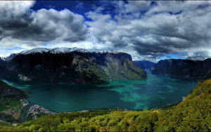 Фотографии Норвегия Гора Небо Облачно Согне фьорд Природа