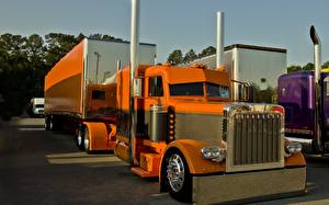 Hintergrundbilder Peterbilt Lastkraftwagen Orange Vorne Fahrzeugscheinwerfer Autos