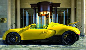 Bureaubladachtergronden BUGATTI Geel kleur Zijaanzicht Luxe 2012 Veyron 16.4 Grand Sport Auto