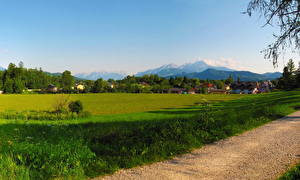Bureaubladachtergronden Oostenrijk Salzburg Gras Anif een stad